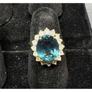 18KT GE Ring with Blue Oval Stone and Clear Stone Accents, Size 7